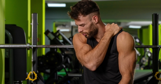 Man feeling pain in the gym