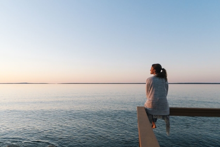 woman sitting on the water