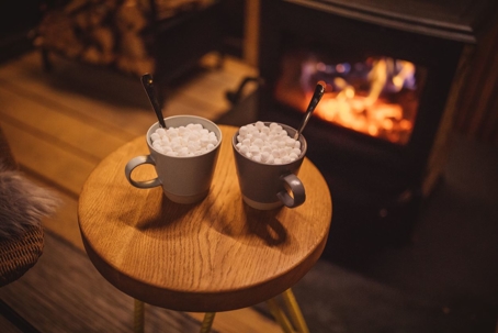 hot chocolate in front of fire