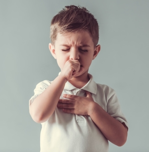 Little boy coughing